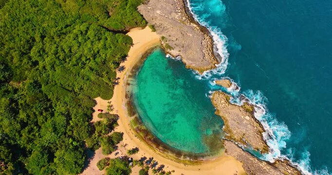 Spectacular semicircle beach in Manati, Puerto Rico. Iconic sandy beach protected from the tide by the rocks. Top view.