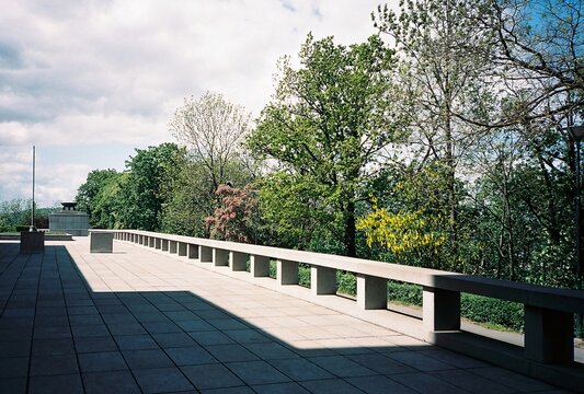Modernist stone terrace with dramatic shadows at Vitkov Hill, analog photography