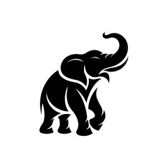 Obraz premium Majestic elephant standing proudly with raised trunk in elegant pose