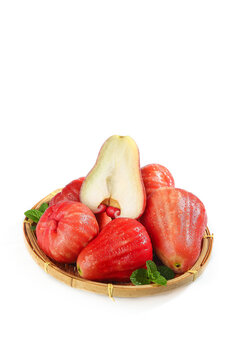 Fresh Red Rose Apples Wax Apples from Hainan in Bamboo Basket Tropical Fruit White Background