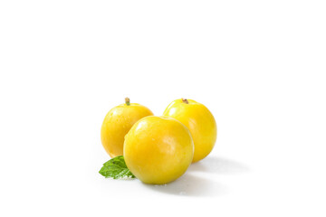 Fresh Yellow Plums from Guizhou China with Mint Leaf Healthy Organic Fruit on White Background