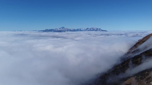 Aerial Drone View from Mount Stol Above Clouds on a Sunny Autumn Day, Slovenia