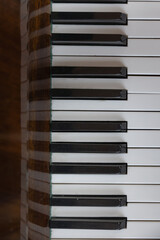 Close-up of Vintage Piano Keys with Selective Focus and Wooden Texture
