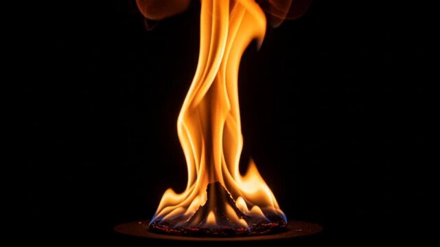 Flame Burning on Dark Background.