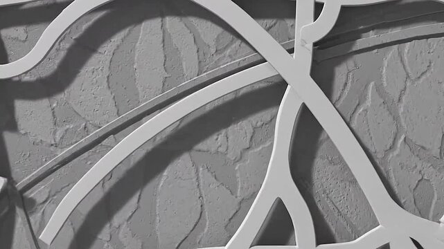 Sophisticated gray wall featuring intricate circular and border relief patterns.
