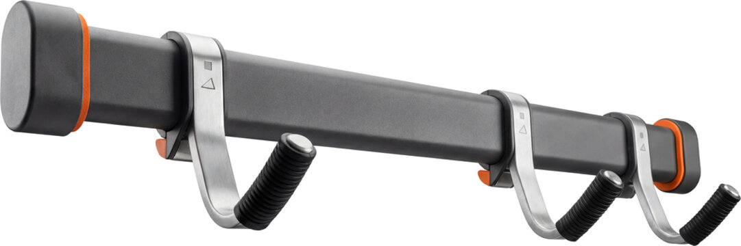 Wall-mounted ski rack with adjustable hooks.
