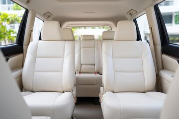 Spacious and Modern Interior of Compact Passenger Vehicle with Neutral Background