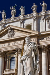 Saint Peter's Square Statue of Saint Paul in Basilica Forecourt and Facade of Saint Peter's Basilica Italy Rome Vatican City © Marcel