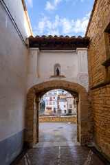 Naklejka premium Portal of San Pablo in the walled enclosure of Iglesuela del Cid, Teruel, Aragon, Spain