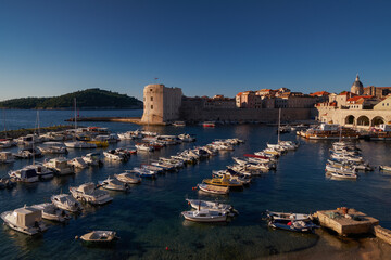 St. John Fortress and harbor boats at sunrise - Dubrovnik, Croatia