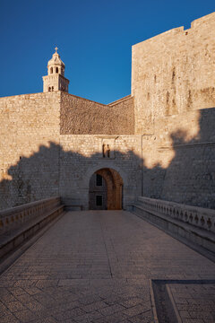 Ploce Gate bridge and Dominican Monastery at sunrise - Dubrovnik, Croatia