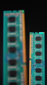 Computer RAM or Random Access Memory, chips on the board, increasing price concept. DDR RAM memory cards are used for AI data centers. Supply chain tightening due AI boom and high demand. Vertical.
