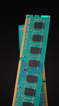 RAM memory sticks module macro view, computer hardware. RAM shortage and prices increase due AI boom high demand concept. AI data center manufacturing is consuming immense amounts of memory. Vertical.