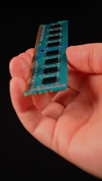 Memory RAM module for PC computers and  Artificial Intelligence AI and data centers. DDR Random Access Memory high demand for AI specific memory and processing. Computer Hardware. Vertical.