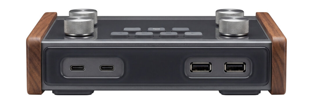 Desktop DSP interface with wooden side panels and multiple USB ports
