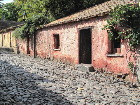 Red Historic House on a Cobblestone Street &ndash; Colonia del Sacramento