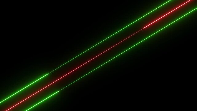 Diagonal neon laser beams: two bright green outer beams with a thin red beam between them across a black background, glowing streaks and motion effect