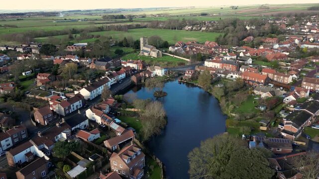 Aerial Video of Nafferton Village East Riding Yorkshire UK.Nafferton is a village and civil parish in the East Riding of Yorkshire, England. It is situated approximately 2 miles (3.2 km) north-east of