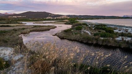Obraz premium Aerial view of Baia Sant'Anna Pond at sunset, Budoni, Sardinia, Italy.