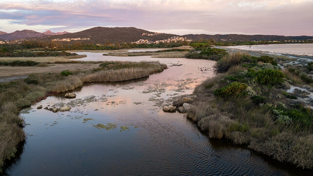 Aerial view of Baia Sant'Anna Pond at sunset, Budoni, Sardinia, Italy.