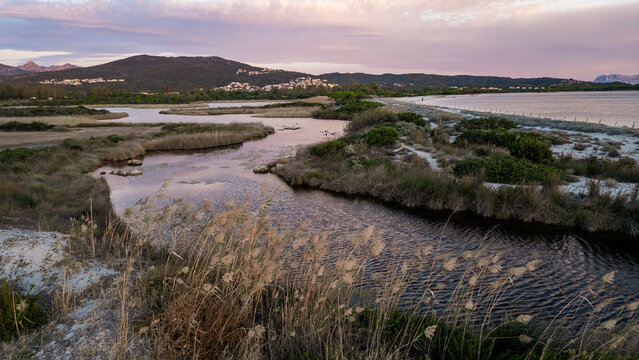 Aerial view of Baia Sant'Anna Pond at sunset, Budoni, Sardinia, Italy.
