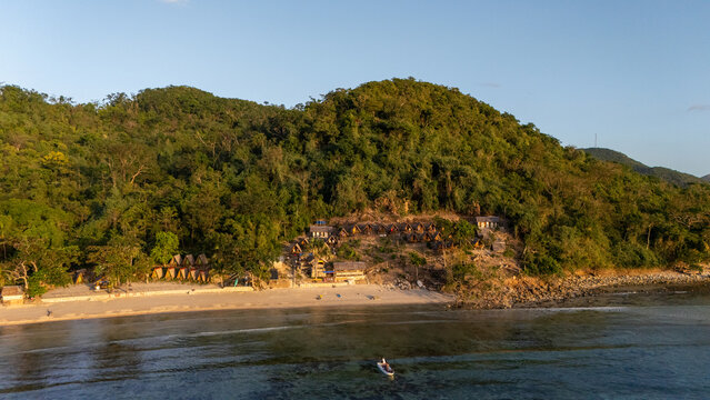 Drone aerial view of KMAAL campsite in Linapacan near Coron in The Philippines.
