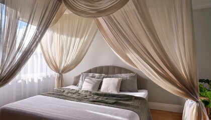 elegant canopied bed adorned with flowing sheer drapes inviting relaxation and tranquility in a