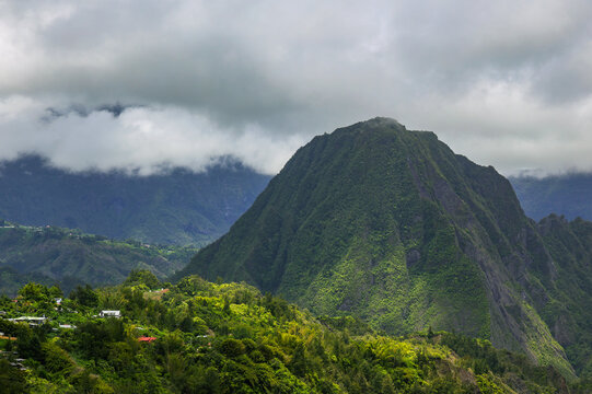 Scenic cloudy landscape of Cirque de Salazie, La Reunion island, French oversea department, Indian Ocean	