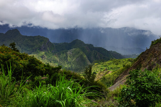 Scenic cloudy landscape of Cirque de Salazie, La Reunion island, French oversea department, Indian Ocean	