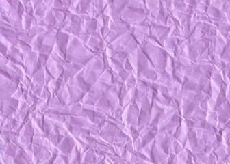 Fototapeta premium Old crumpled purple paper texture. Wrinkles and folded paper template background.