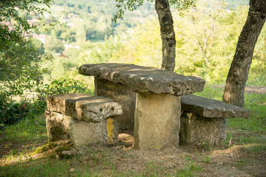 France,  Midi-Pyr&eacute;n&eacute;es.  Uncomfortable looking stone picnic table and benches in the Dordogne Valley.