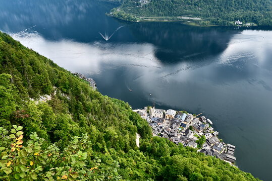 Aerial Top Down View of Village Rooftops and Green Forest Hallstatt Austria Travel Background