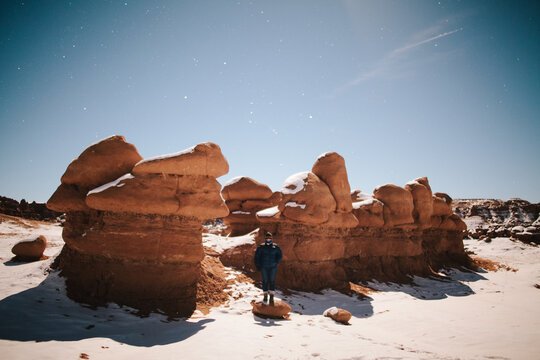 Red rocks in a snowy landscape Goblin Valley