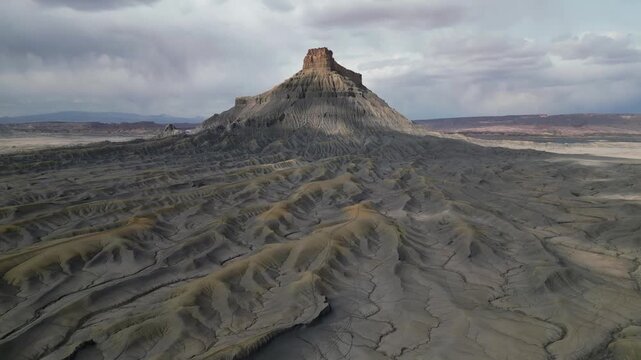 Aerial footage of Factory Butte in Utah , otherworldly landscapes with unique rock formations from drone. Tourist attraction, landmark 