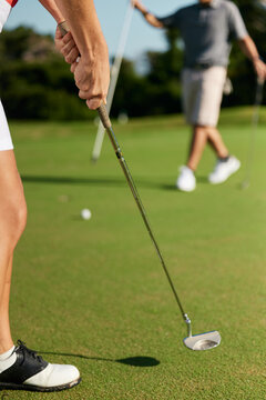 Golfer Preparing for a Putt