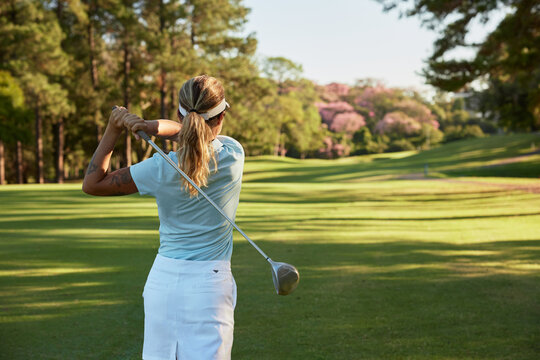 Golfer Watching the Ball After a Swing