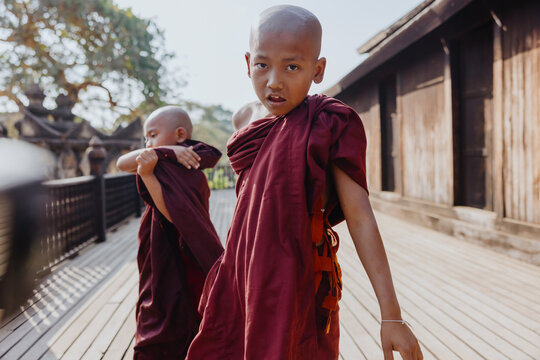 Monks in playful stride