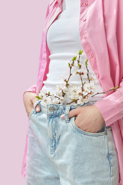 Midsection of unknown woman standing in multicoloured casual clothes
