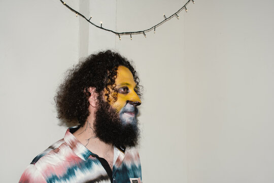 Smiling Man with Lion Makeup