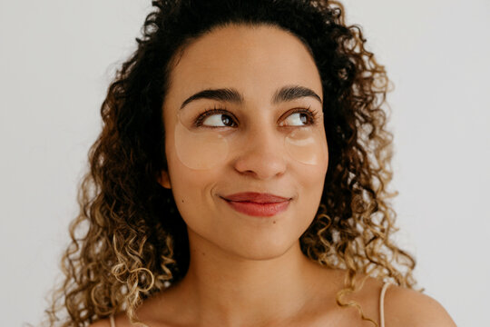 Model with eye patches on face