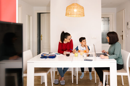 Family time and discussion in a modern kitchen setting