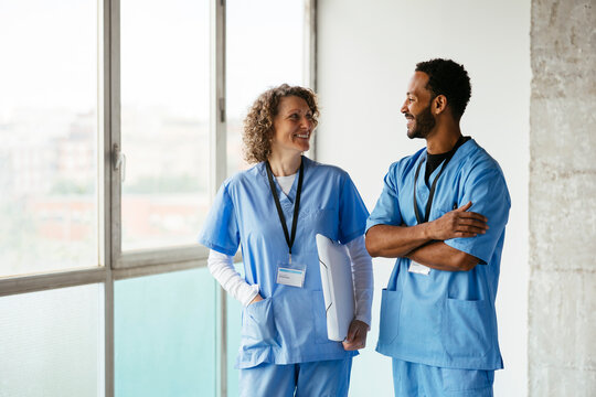 Confident doctors talking together at hospital