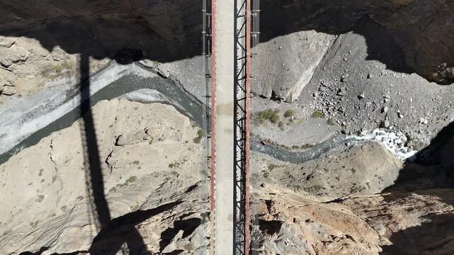 Scenic View of Chicham Bridge and Barren Mountain Terrain