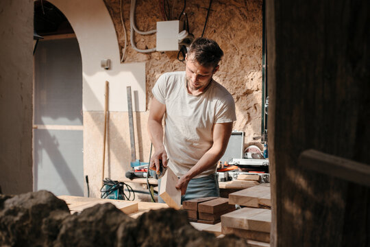 Carpenter working at his workshop
