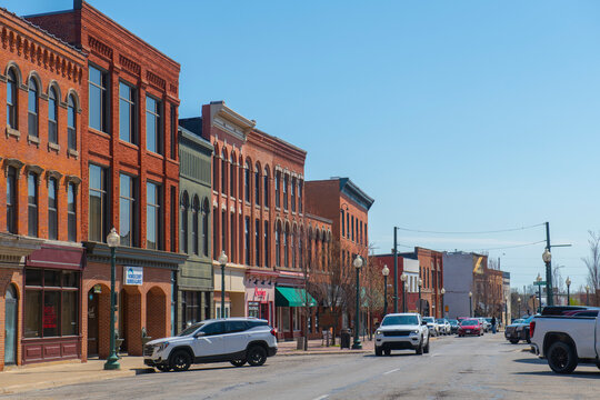 Historic commercial buildings on E Front Street at Monroe Street in historic downtown Monroe, Michigan MI, USA. 