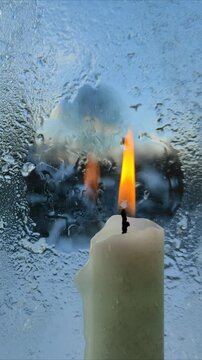 Frozen glass melts from burning candle №8 ( slow motion )