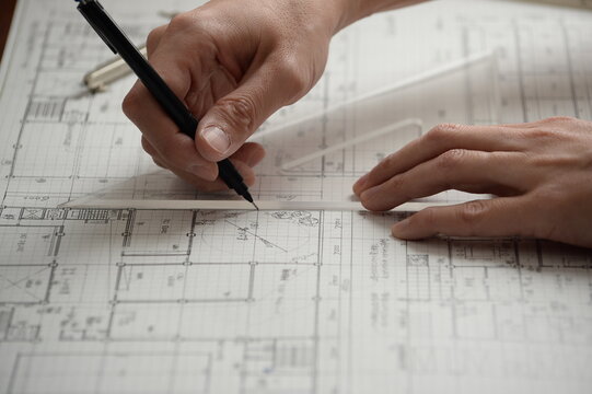 建築図面を製図する日本人建築士の手元 A Japanese architect drafting architectural drawings