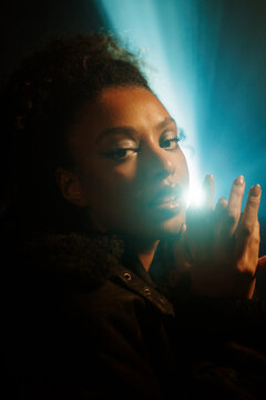 Portrait Woman With Light Rays Behind 