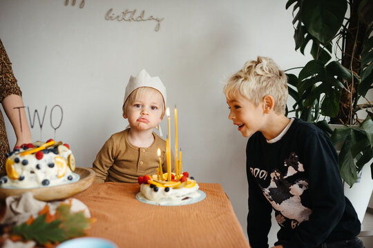 Young boy's reaction during birthday celebration