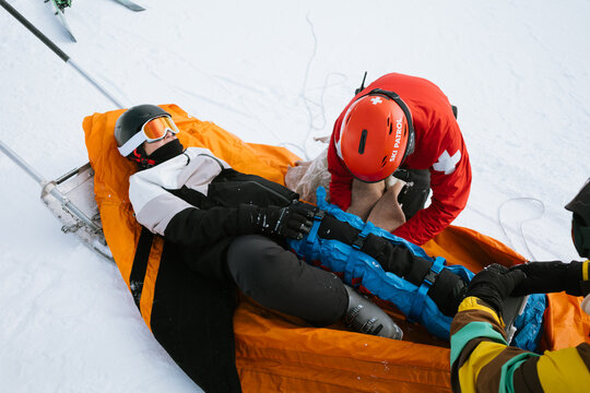 Ski Patrol Assisting Injured Skier
